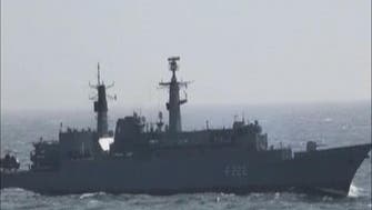 1800GMT: Iran says warns U.S. warship to leave waters near Hormuz