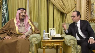 French President Francois Hollande (right) seen meeting with Saudi King Salman bin Abdul Aziz at the Diwan royal palace in Riyadh, on January 24, 2015. (AFP)