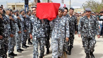 Militants hand over two bodies to Lebanese army