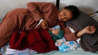 Moment of joy as Nepal baby born in field hospital after quake