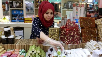 In Iraqi malls, Syrian women work jobs spurned by locals