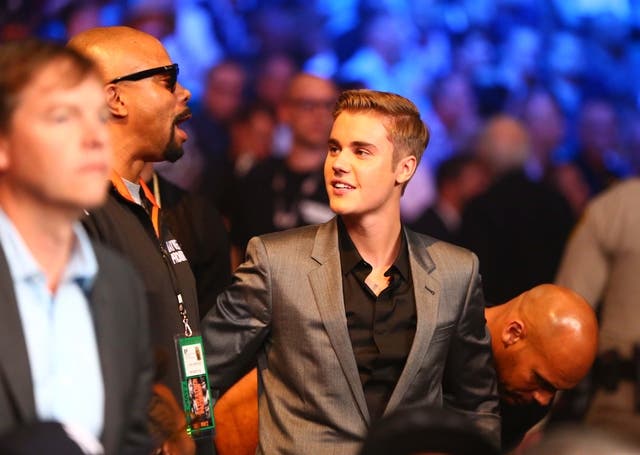 Justin Bieber in attendance during the world welterweight championship. (Reuters)