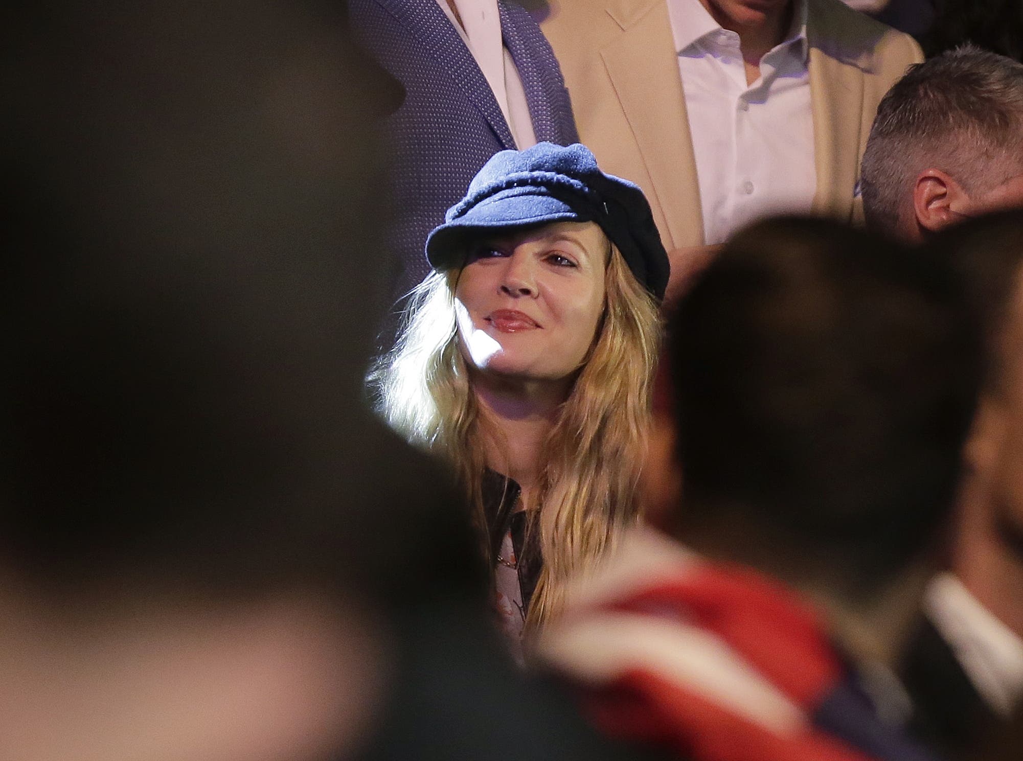Actress Drew Barrymore joins the crowd before the start of the world welterweight championship. (AP)