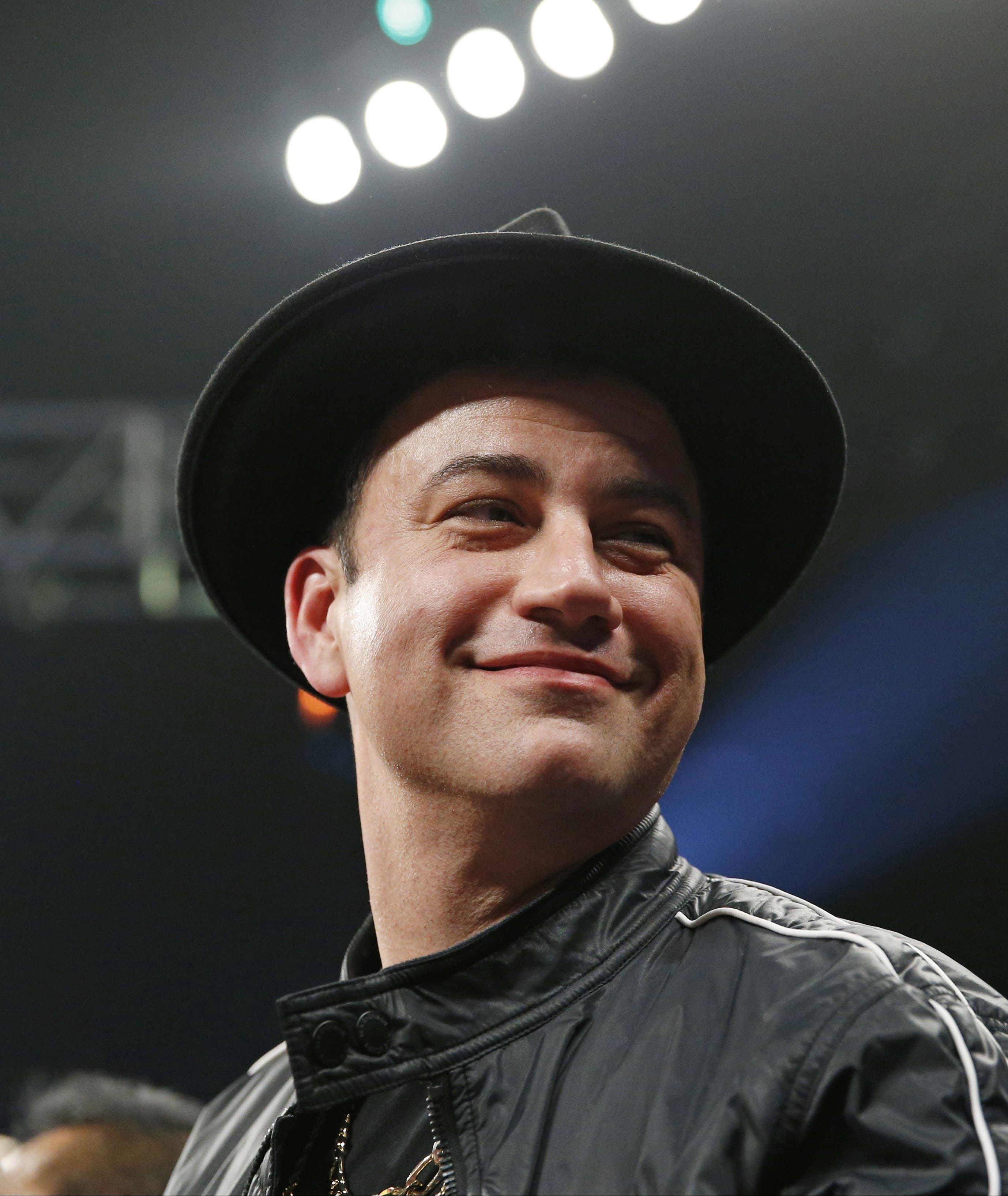Comedian Jimmy Kimmel joins the crowd before the start of the world welterweight championship. (AP)