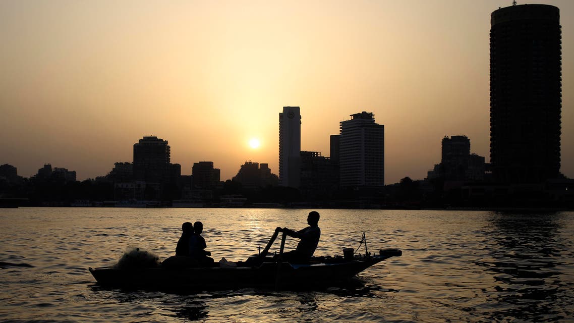 Egyptian fishermen fish on the Nile River as the sun sets in Cairo, Egypt, Tuesday, April 21, 2015. (AP)