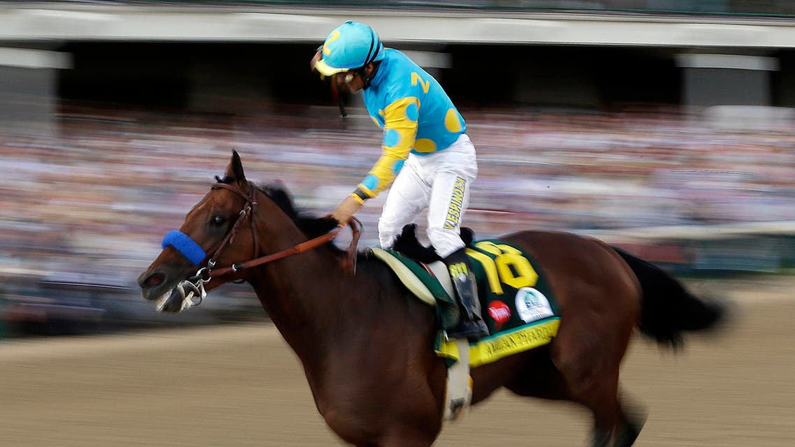 Victor Espinoza rides American Pharoah to victory in the 141st running of the Kentucky Derby horse race at Churchill Downs Saturday, May 2, 2015, in Louisville, Ky. (AP)