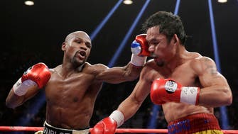 Pacquiao's coach says Mayweather can be beaten in rematch 