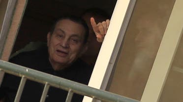 Ousted Egyptian president Hosni Mubarak waves to his supporters outside the area where he is hospitalized during his birthday at Maadi military hospital on the outskirts of Cairo May 4, 2015. (Reuters)