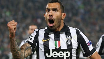 Tevez penalty stuns Real in absorbing contest