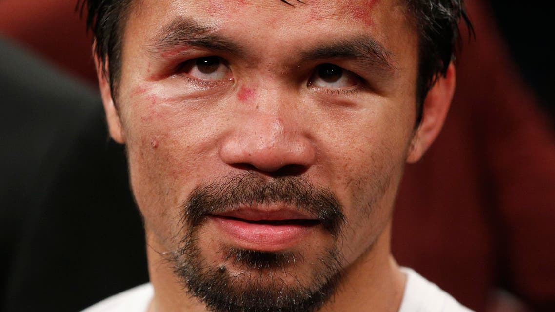 Manny Pacquiao, from the Philippines, waits after the welterweight title fight against Floyd Mayweather Jr., on Saturday, May 2, 2015 in Las Vegas. (AP Photo/John Locher)