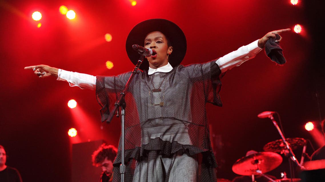 Singer Lauryn Hill performs at Amnesty International's "Bringing Human Rights Home" Concert at the Barclays Center on Wednesday, Feb. 5, 2014 in New York. (Photo by Evan Agostini/Invision/AP)