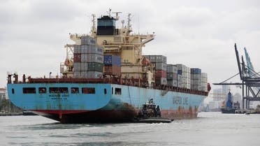 In this Friday, May 16, 2014 file photo, a Maersk Line vessel is guided by a tugboat as it heads into the Port of Miami off of Miami Beach, Fla. (AP)