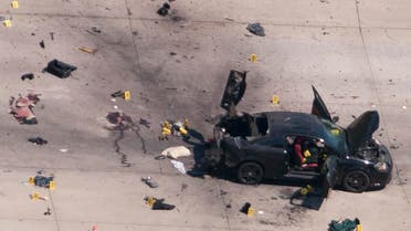 An aerial view shows the car that was used the previous night by two gunmen, who were killed by police, as it is investigated by local police and the FBI in Garland, Texas May 4, 2015. AP