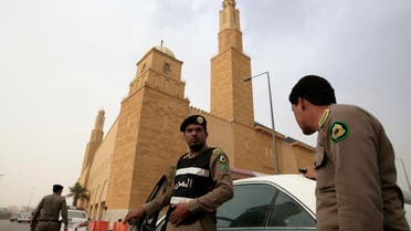 Saudi policemen form a check point outside Al Rajhi mosque where a demonstration was expected to take place in Riyadh, Saudi Arabia, Friday, March 11, 2011. Hundreds of police have deployed on the streets of the Saudi capital ahead of planned protests calling for democratic reforms in the kingdom. The rare security turnout highlights authorities' concerns about the possibility of people gathering after Friday prayers. Although protests have so far been confined to small protests in the country's east where minority Shiites live, activists have been emboldened by other uprisings and have set up online groups calling for protests in Riyadh Friday. (AP Photo/Hassan Ammar)