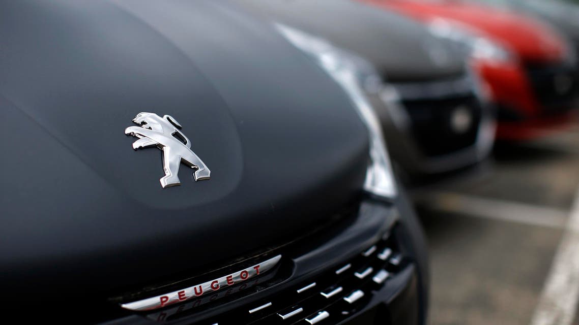 Peugeot 208 cars are parked at the PSA Peugeot Citroen plant in Poissy, near Paris, France, April 29, 2015. PSA Peugeot Citroen said on Wednesday its revenue rose in the first quarter as the recovering French carmaker's efforts to raise prices helped offset weaker volumes. REUTERS/Benoit Tessier