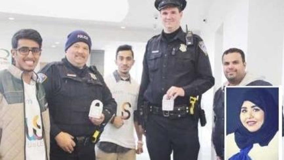 Saudi students pose with top police officials in Cleveland, Ohio. (Saudi Gazette)