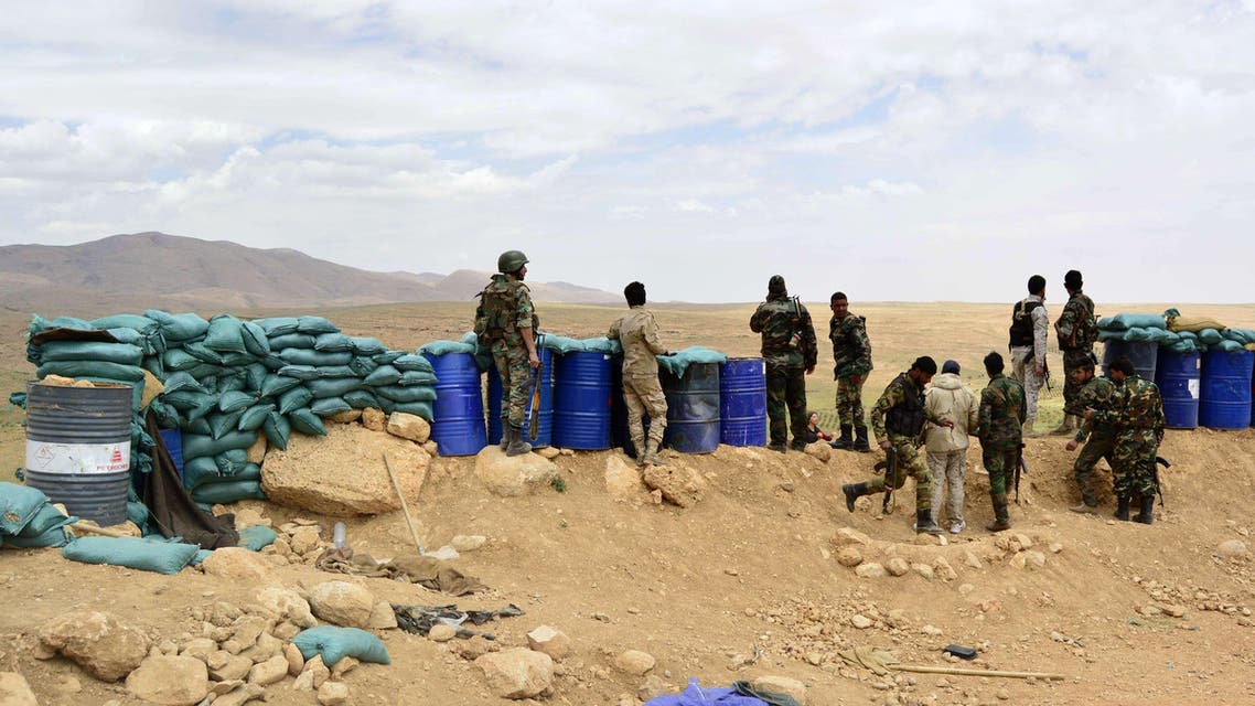 Syrian regime seized control of several hilltops in the mountainous area that straddles the Syria-Lebanon border with the support of Lebanon's Hezbollah movement. (AFP)