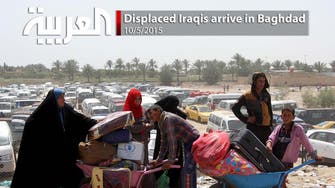 Displaced Iraqis arrive in Baghdad