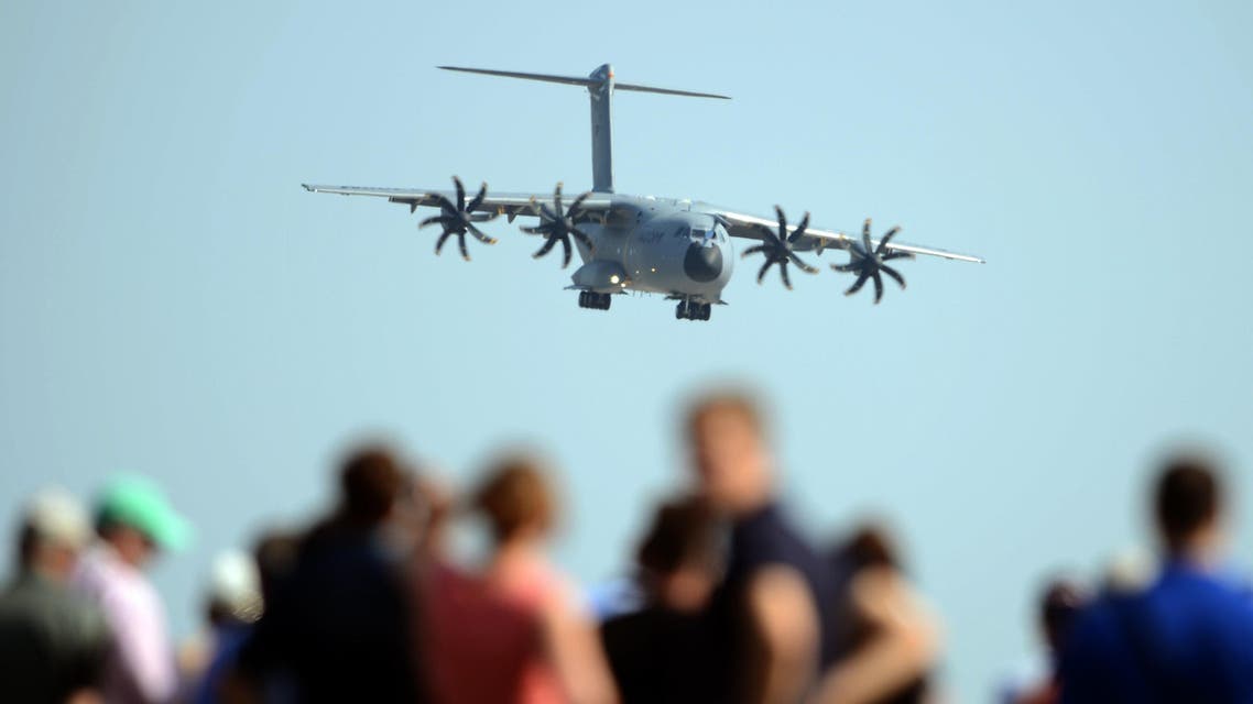 isitors watch while an Airbus A400M lands a the International Air Show ILA in Schoenefeld, near Berlin. (File: AFP)