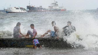 Two dead after powerful typhoon passes north Philippines