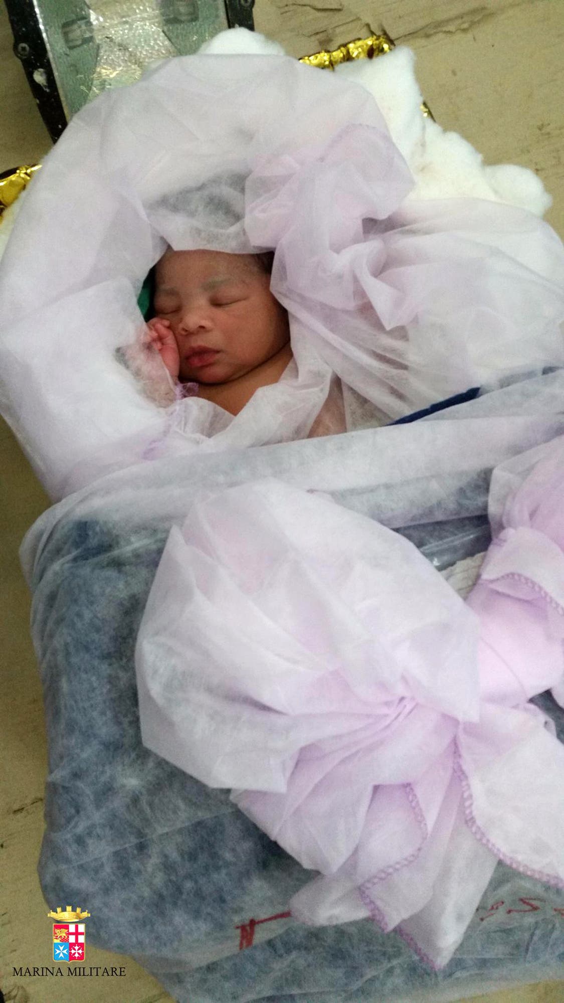 The navy said a woman, in labor when rescued Sunday, gave birth to a girl aboard of its patrol ship 'Bettica'. AP