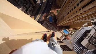 Watch freerunner jump between pillars on 43rd floor of Dubai hotel 