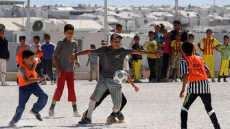 Soccer eases life in Jordan refugee camp, until goal dispute