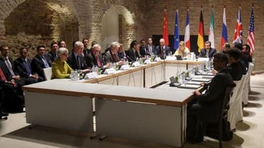 Negotiators of Iran and six world powers face each other at a table in the historic basement of Palais Coburg hotel in Vienna April 24, 2015. Nuclear talks are making good but slow progress as they work towards a June 30 deadline for a final deal, Tehran's senior negotiator Abbas Araqchi said on Friday. REUTERS/Heinz-Peter Bader 