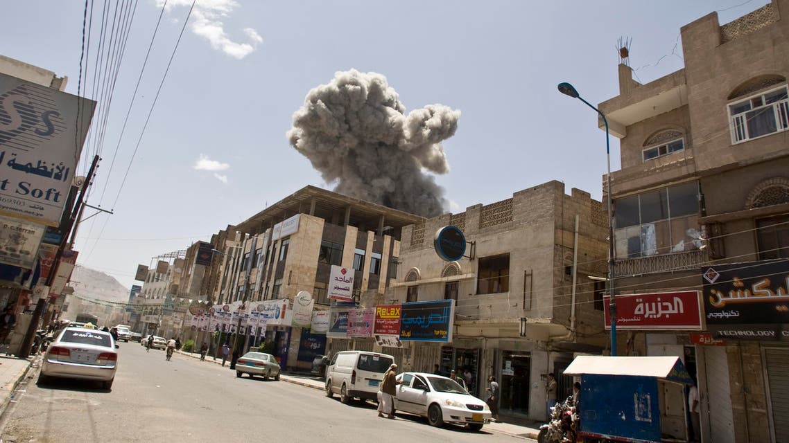 Smoke rises from a house of former Yemeni President Ali Abdullah Saleh after a Saudi-led airstrike in Sanaa, Yemen, Sunday, May 10, 2015. (AP Photo/Hani Mohammed)