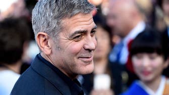 Clooney, astronauts mark 45th anniversary of Apollo 13