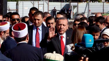 Turkey’s President Recep Tayyip Erdogan hails Albanian Muslims at the inauguration ceremony of the Namazgja Mosque construction that started to be built in Tirana Wednesday, May 13, 2015 with a 30 million euro funding from Turkey. Erdogan held a visit to Tirana to discuss increasing economic ties with the small Balkan nation, heading a delegation of about 100 businessmen as he arrived in the capital for meetings with Albanian government officials. (AP Photo/Hektor Pustina)