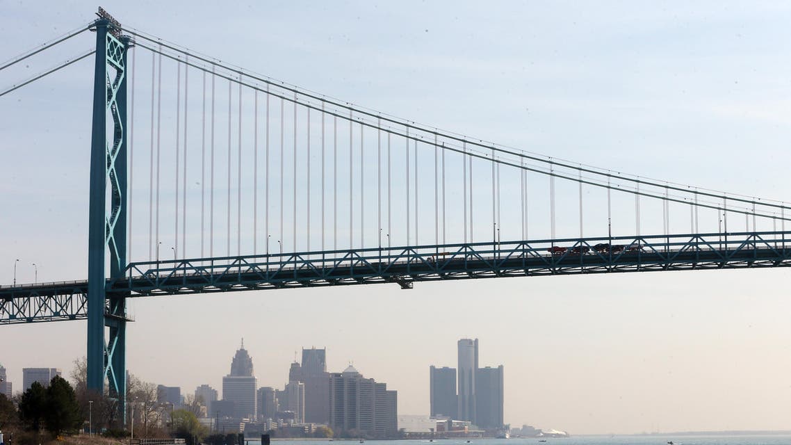 In a photo from April 29, 2015, the Detroit skyline is seen under the Ambassador Bridge. (AP