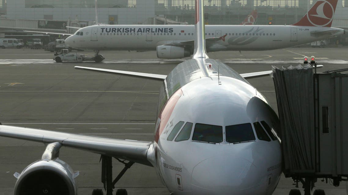 A Turkish Airlines plane is towed on the tarmac of Brussels international airport on Thursday, Nov. 20, 2014. (AP)