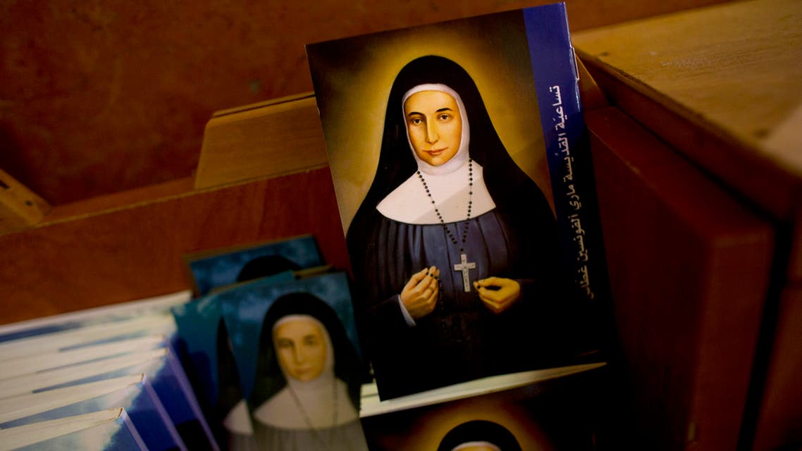  In this Thursday, May 7, 2015 photo, booklets showing the likes of Marie Alphonsine Ghattas, a nun who lived in what was Ottoman-ruled Palestine in the 19th century, are on display in Church of the Rosary Sisters Mamilla in Jerusalem. (AP)