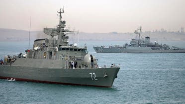 In this picture taken on Tuesday, April 7, 2015, and released by the semi-official Fars News Agency, Iranian warship Alborz, foreground, prepares before leaving Iran's waters. (AP)