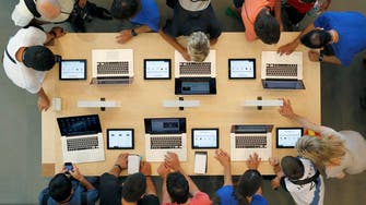 Apple updates MacBook Pro, cuts price on high-end iMac