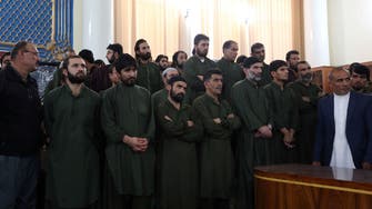 Eleven Afghan police get year in jail over mob killing of woman