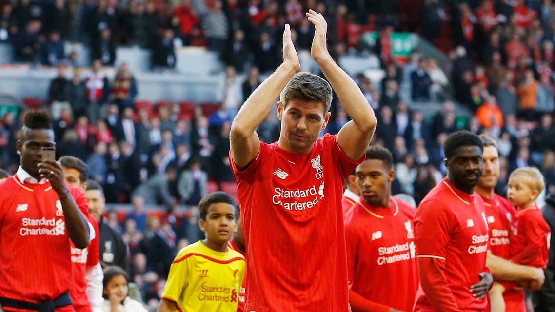 Liverpool's Steven Gerrard acknowledges the crowd as he walks on the pitch after his final game at Anfield. Reuters
