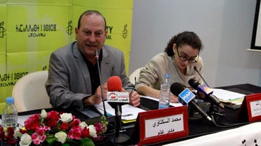 Amnesty International director Mohammed Sektaoui, left, addresses reporters at a press conference next to Amnesty researcher Sirine Rached, in Rabat, Morocco, Tuesday, May 19, 2015. Human rights group Amnesty International has issued a report documenting widespread torture by the Moroccan state, contrary to its public commitment to reform. The report recommended that lawyers be present during interrogations, allegations of torture be investigated and those reporting abuses be protected -- all measures present in the penal code but rarely implemented. (AP Photo/Paul Schemm)