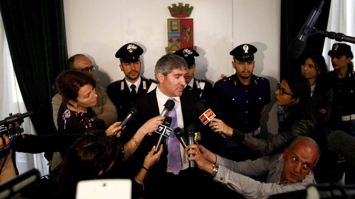 Milan chief anti-terrorism investigator Bruno Megale, center, speaks during a press conference in Milan, Italy, Wednesday, May 20, 2015. AP