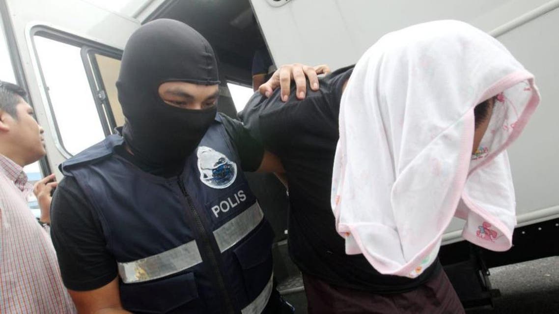 five men and one teenager charged in Malaysia