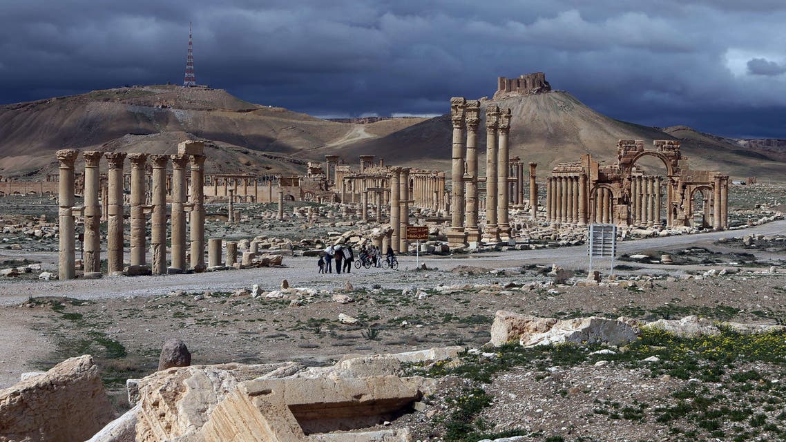 A file picture taken on March 14, 2014 shows the citadel (background) of the ancient oasis city of Palmyra, 215 kilometres northeast of Damascus, over looking the city. AFP