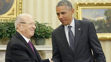 U.S. President Barack Obama (R) shakes hands with Tunisia's President Beji Caid Essebsi in the Oval Office after their meeting at the White House in Washington May 21, 2015.  (Reuters)