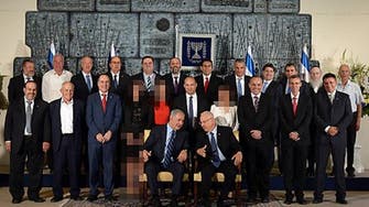 Israeli ultra-orthodox media blurs women in govt. picture 