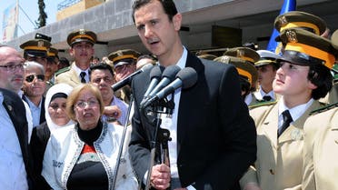 In this photo released by the Syrian official news agency SANA, Syrian President Bashar Assad speaks during a public appearance at a school in Damascus, Syria, Wednesday, May 6, 2015. (AP)