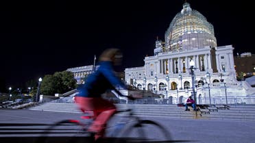 The U.S. Capitol is illuminated at night as the Senate continues to work late, Friday, May 22, 2015 on Capitol Hill as a pile of important bills await action. AP