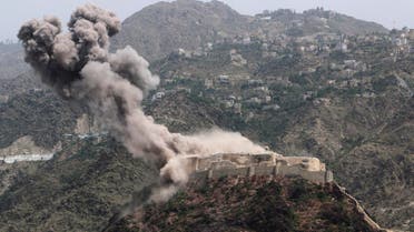Smoke rises from al-Qahira castle, an ancient fortress that was recently taken over by Shiite rebels, following a Saudi-led airstrike in Taiz city, Yemen, Thursday, May 21, 2015. AP 
