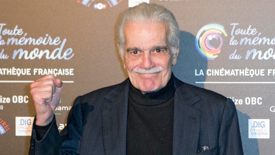 Egyptian film star Omar Sharif poses as he arrives for the Restored International Film festival presentation, at the Cinematheque Francaise, in Paris in 2012. (File: AP)
