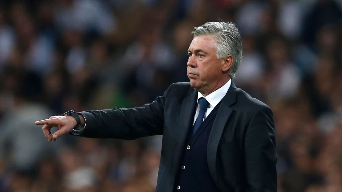 Real Madrid's coach Carlo Ancelotti gives directions to his players during the second leg quarterfinal Champions League soccer match between Real Madrid and Atletico Madrid at Santiago Bernabeu stadium in Madrid, Spain, Wednesday April 22, 2015. (AP)