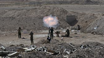 ISIS faces battle in Iraq, bombs in Syria
